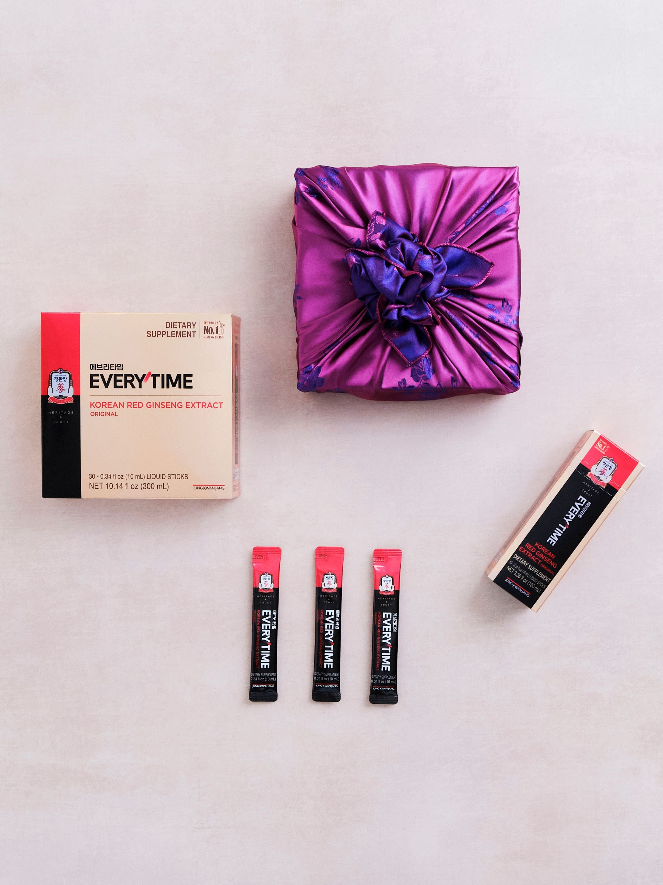 JungKwanJang Korean Red Ginseng Everytime Extract on display with traditional Korean bojagi gift wrapping